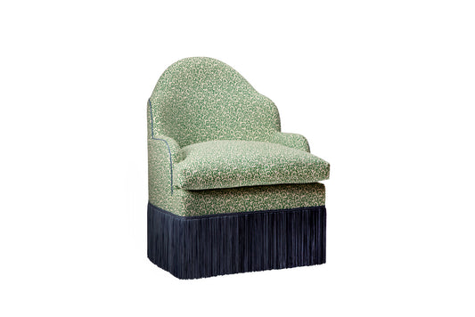 David Seyfried The Editor's Chair Grand on a swivel base in Cathy Nordstrom Barbro Green fabric with Samuel & Sons Barcelona Ombre Fringe in Porcelain Blue. Showroom clearance